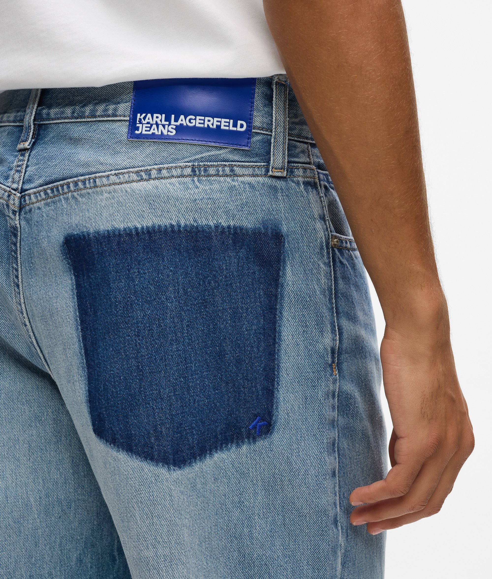 Removed pocket straight jeans