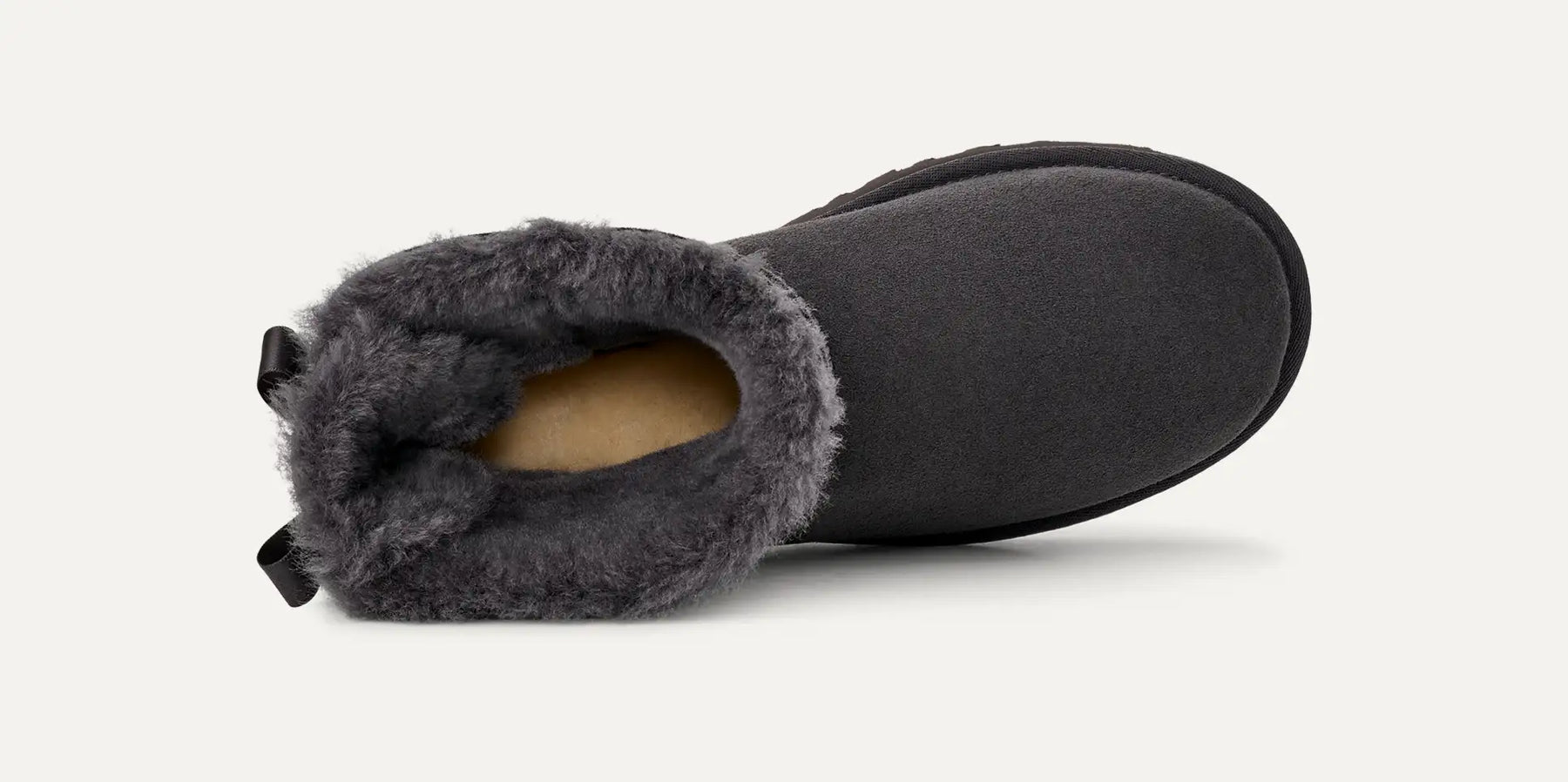UGG® Mini Bailey Bow II Boot – Water-Resistant Sheepskin with Satin Bow Detail