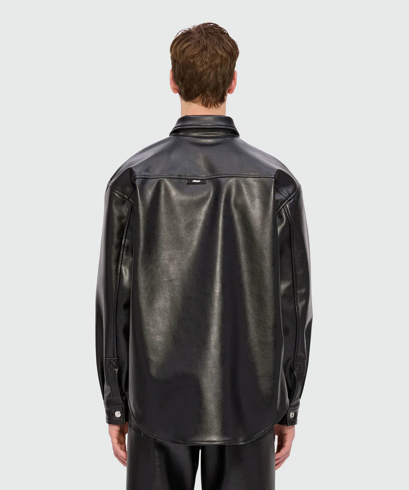 Back view of a black shirt with structured faux leather, classic collar, and logo label on yoke.
