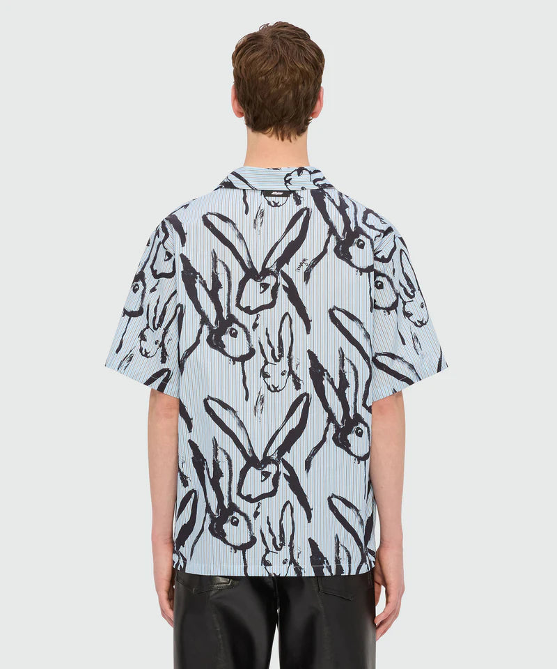 Back view of light blue striped poplin bowling shirt with Sketched Bunnies print, featuring a relaxed fit.