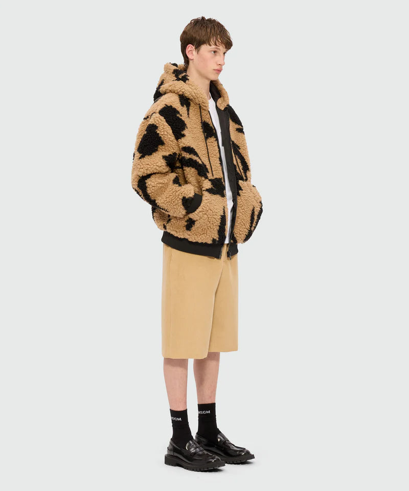 Beige teddy jacket with Follow the Rabbit motif, featuring a drawstring hood and front kangaroo pockets.