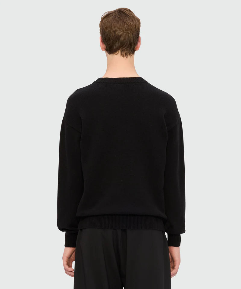 Back view of black cashmere blend sweater with ribbed details and regular fit.
