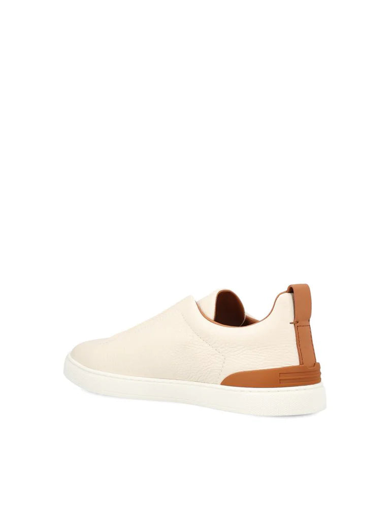 Zegna Men’s Triple Stitch™ White & Brown Deerskin Slip-On Sneakers – Made in Italy | Luxury Casual Footwear