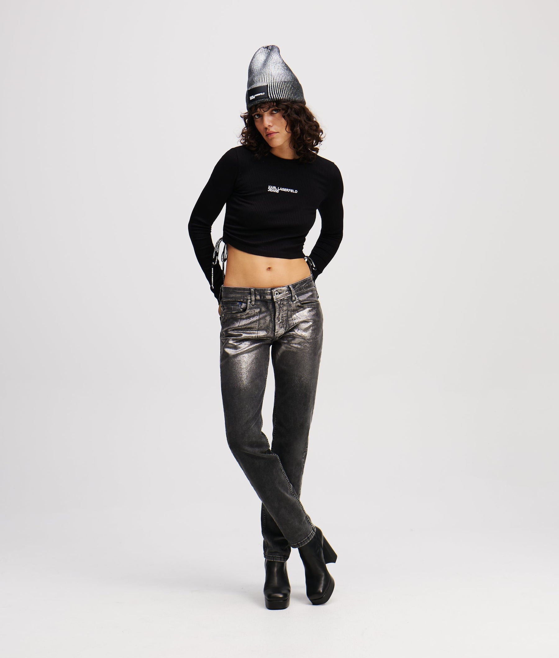 COATED MID-RISE SLIM JEANS