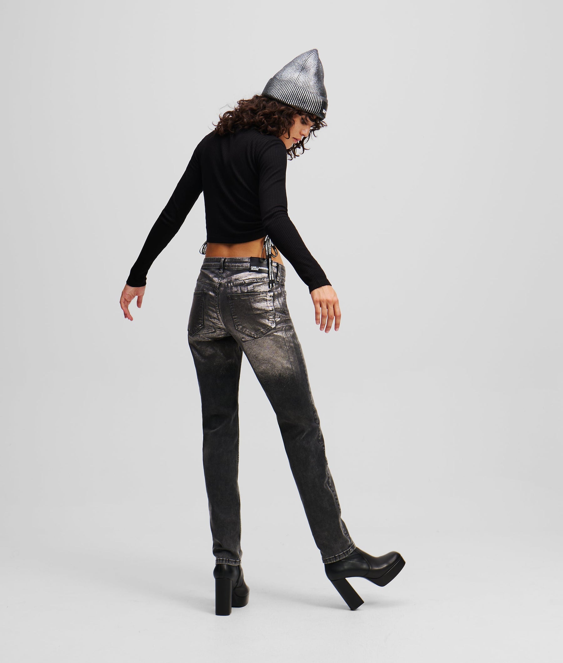 COATED MID-RISE SLIM JEANS
