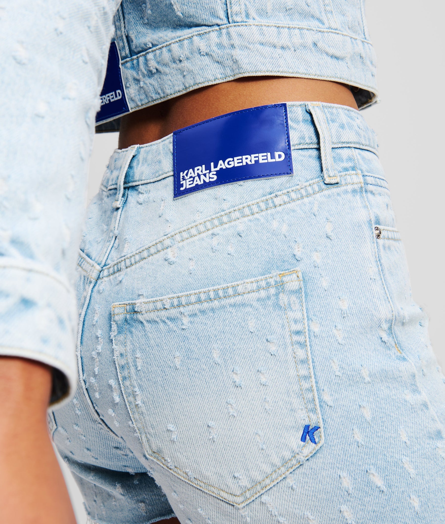 MID-RISE BOUCLÉ DENIM SHORTS