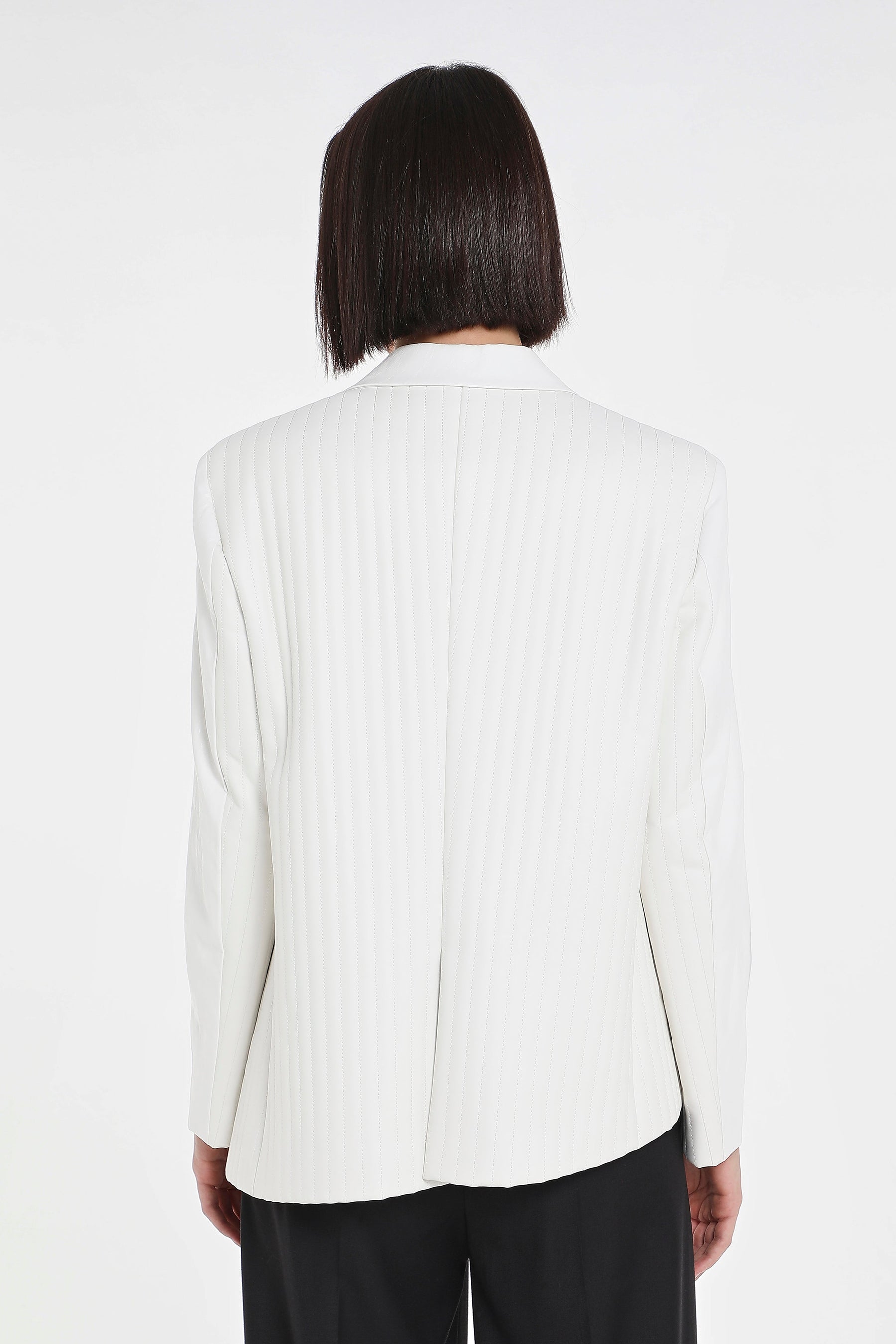 ASYMMETRIC QUILTED VEGAN LEATHER BLAZER