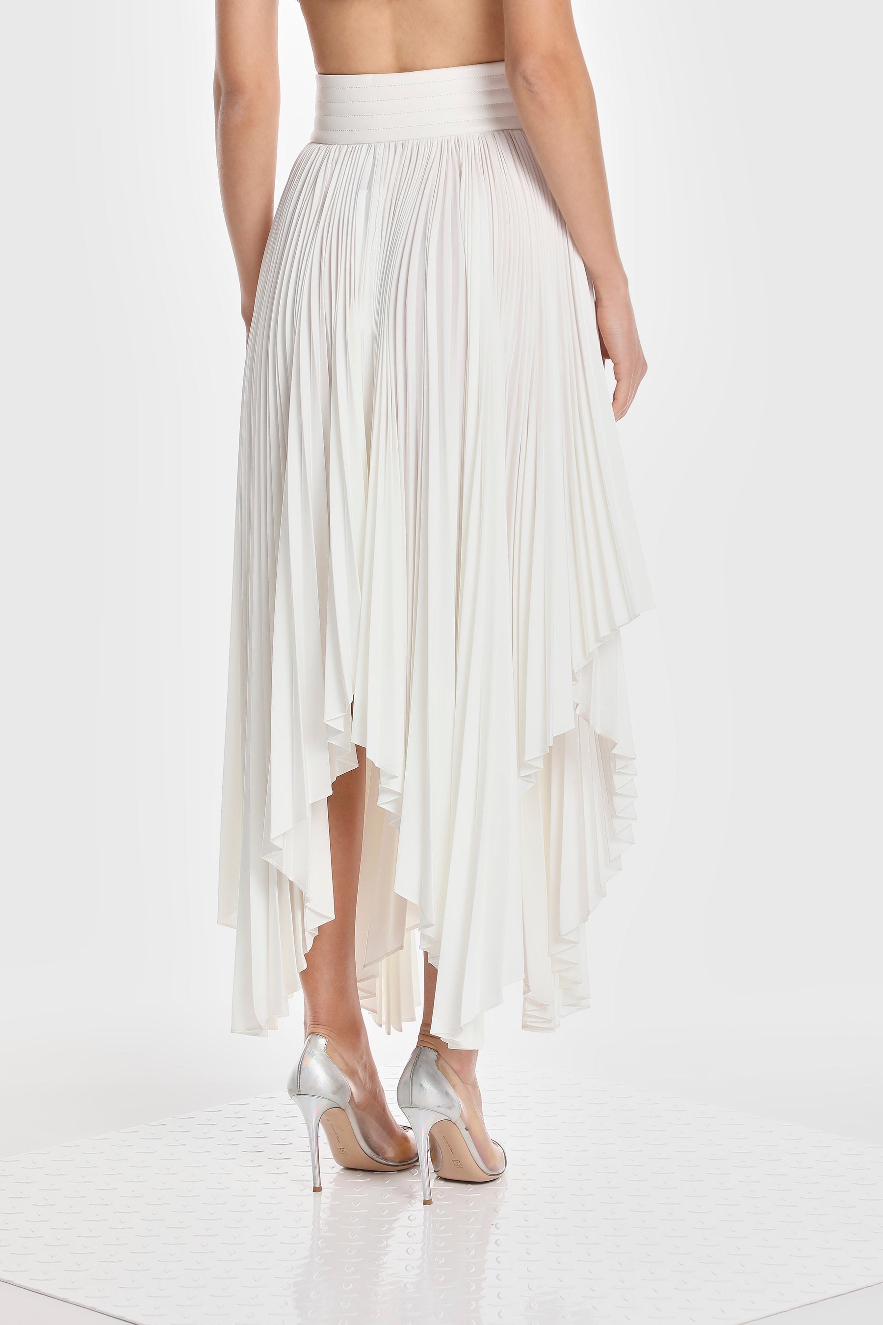 ASYMMETRIC PLEATED SKIRT W/ VEGAN LEATHER WAIST