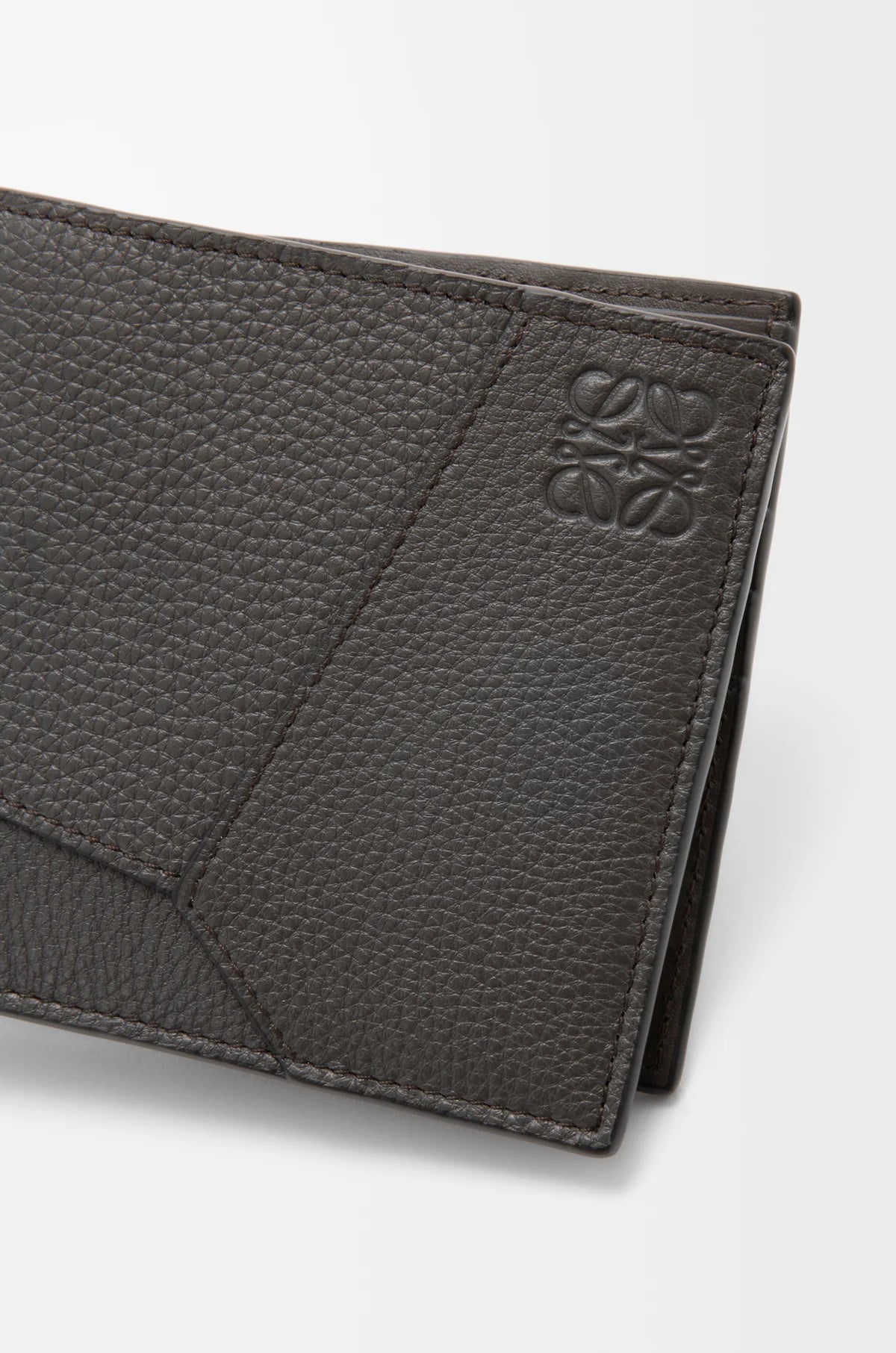 Puzzle bifold wallet in supple grained calfskin