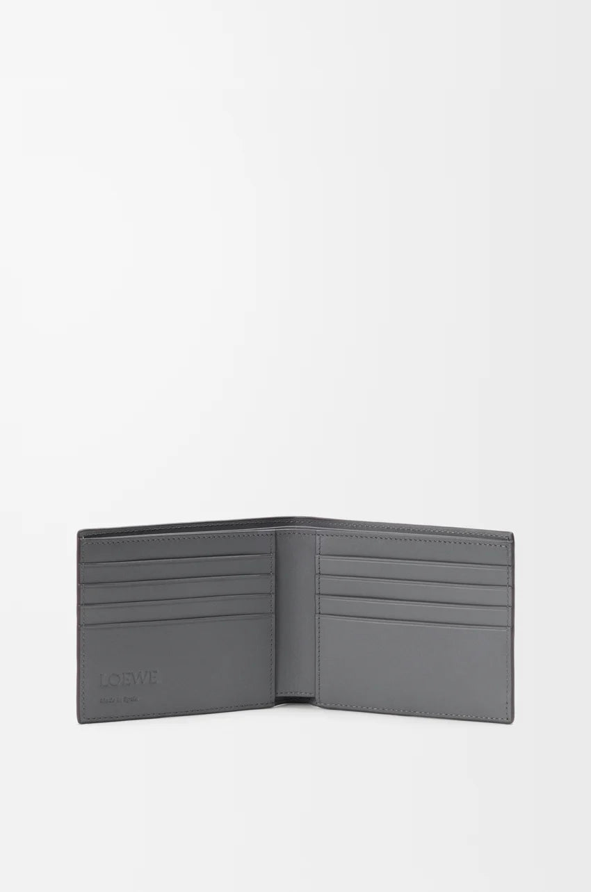 Puzzle bifold wallet in supple grained calfskin