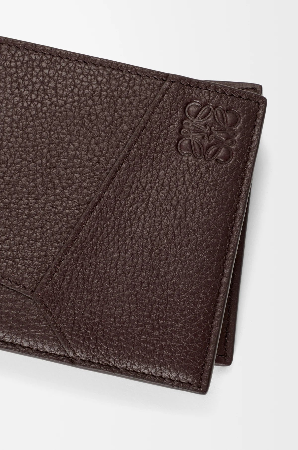 Puzzle bifold wallet in supple grained calfskin