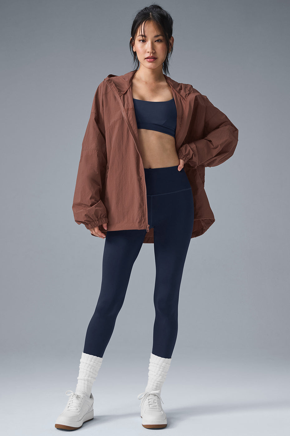 Model wearing Vantage Nylon Ripstop Track Jacket with technical features for running and training in cool weather.