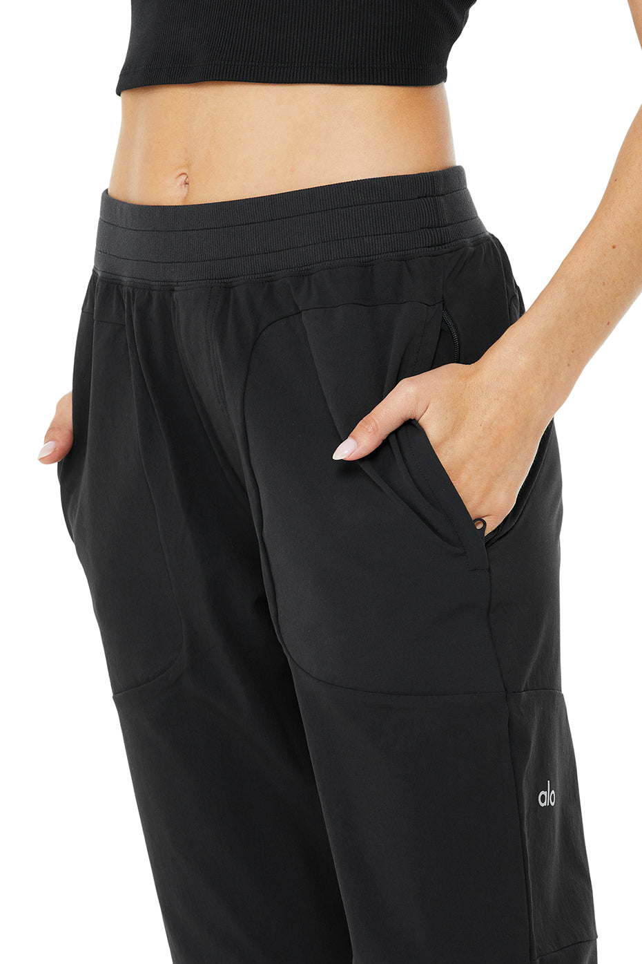 Co-Op Pant featuring an elastic waistband and side-zip pockets, showcasing sleek and streamlined design.