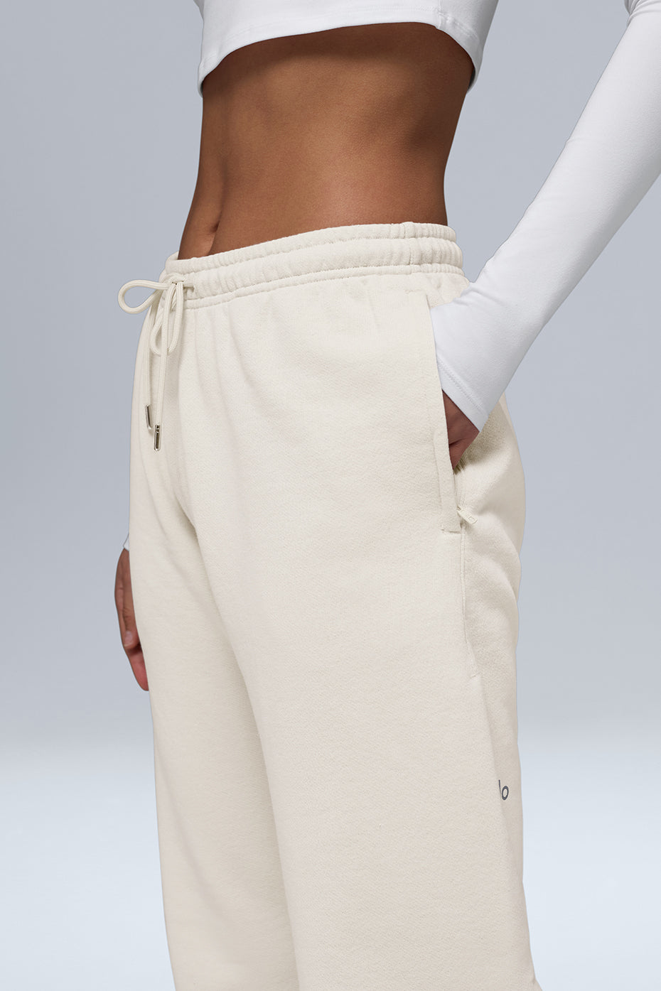 Side view of Chill Sweatpant featuring soft French terry fabric, cuffed bottoms, and side-zippered pockets for everyday comfort.