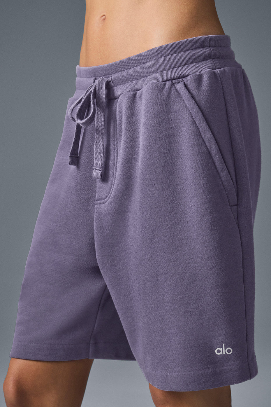 Chill Short in purple French terry fabric with drawstring and side-zip pockets for comfortable lounging