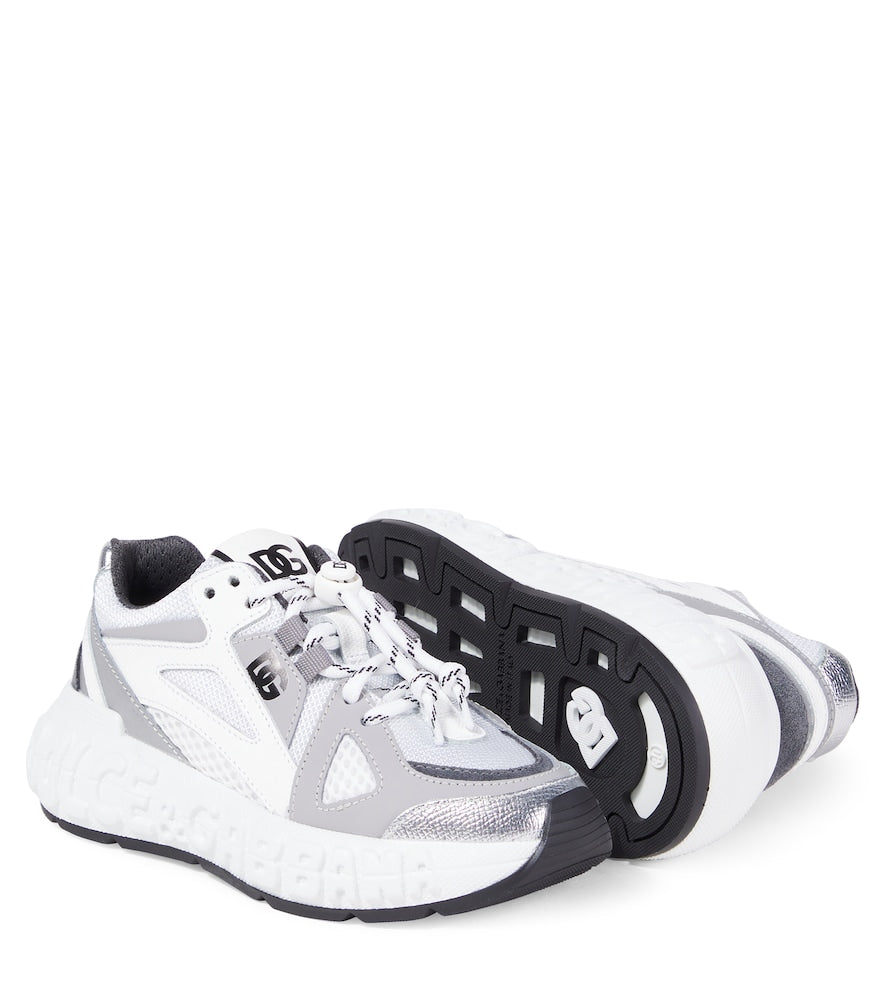 Embossed logo leather-trimmed sneakers