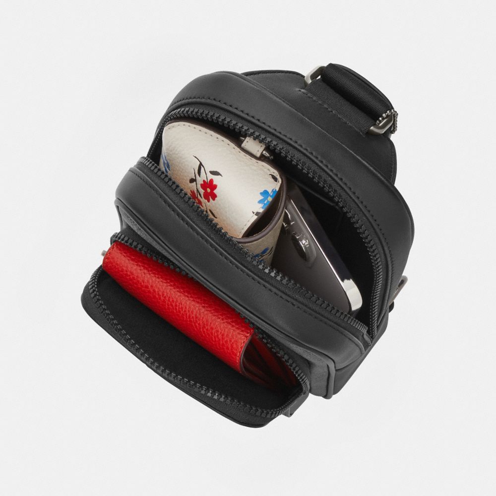 Racer Sling Pack In Loved Signature Denim