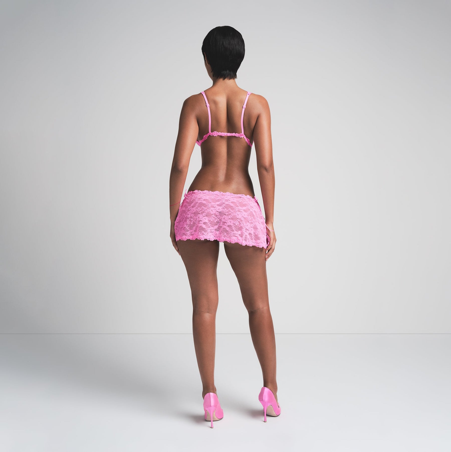 STRETCH LACE TIE SIDE MINI SKIRT | SUGAR PINK