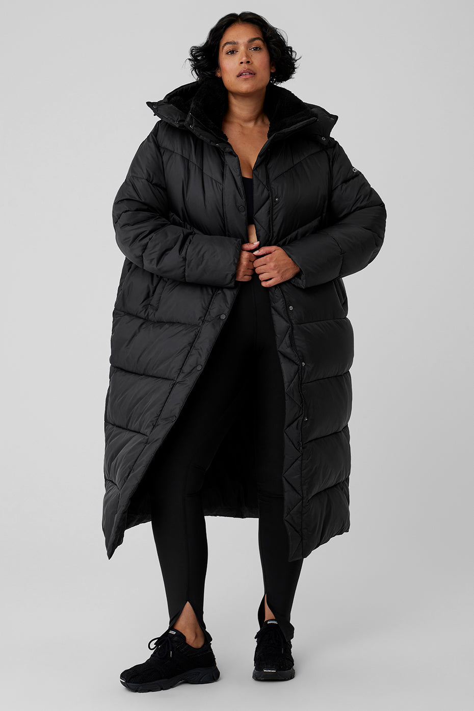 Gold Rush Puffer trench coat featuring oversized fit and sherpa-lined collar for winter warmth.