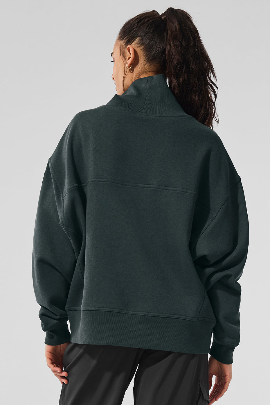 Hazy Mock Neck Pullover in dark color showcasing oversized fit and cozy design from the back.