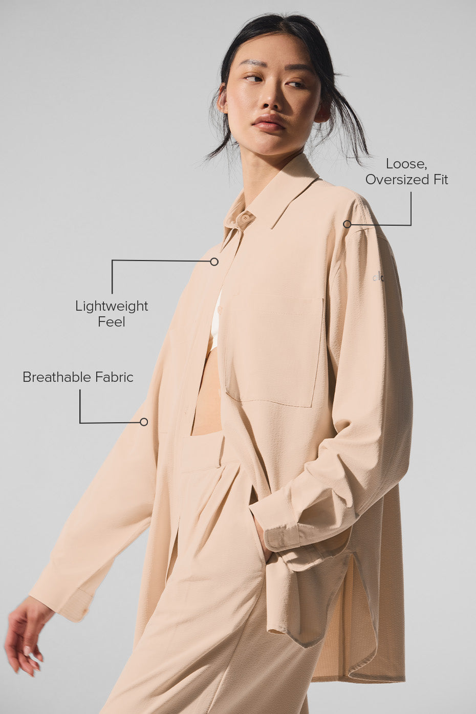 Model wearing the Dreamscape Button Down Long Sleeve in a loose oversized fit, showcasing breathable and lightweight fabric.