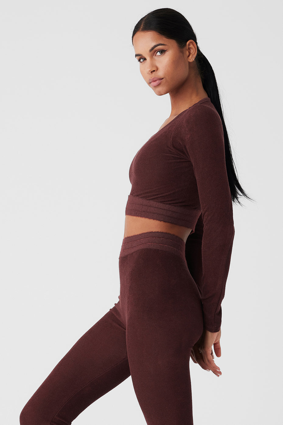 Model wearing Seamless Luxe Terry Cuddle Coverup in warm burgundy, showcasing soft fabric and relaxed fit.