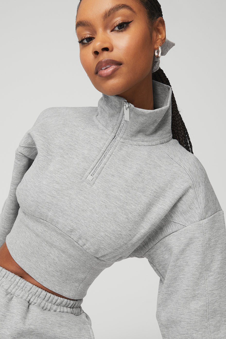 Model wearing Vixen Fleece 1/4 Zip in gray with high neck and cropped design for a stylish, flattering look.