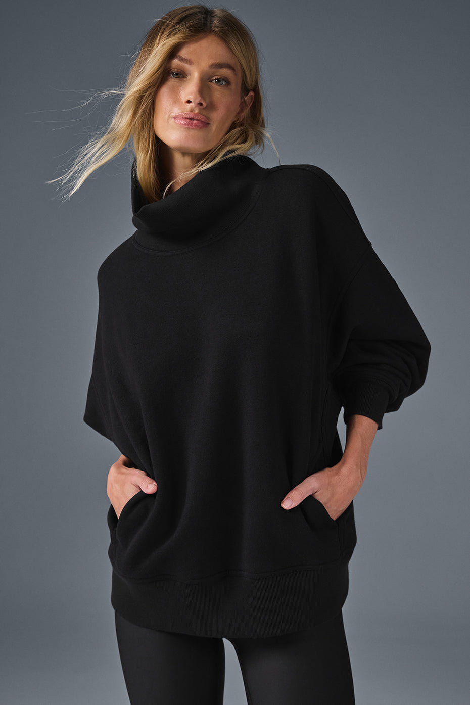 Hazy mock neck pullover in black, oversized cozy sweater with pockets, perfect for casual or lounge wear.