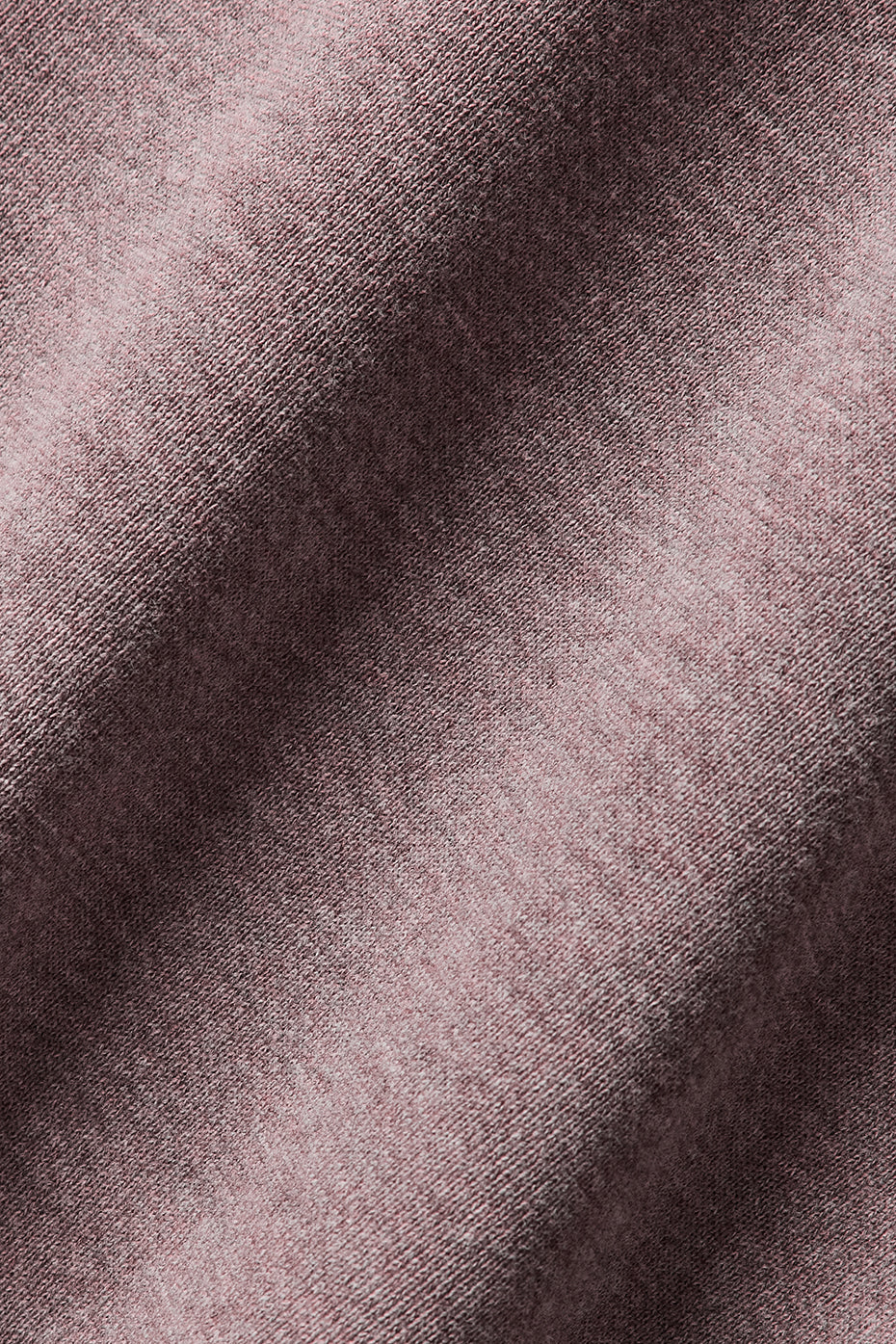Close-up of soft, cozy fabric texture of the Hazy Mock Neck Pullover in a blush color