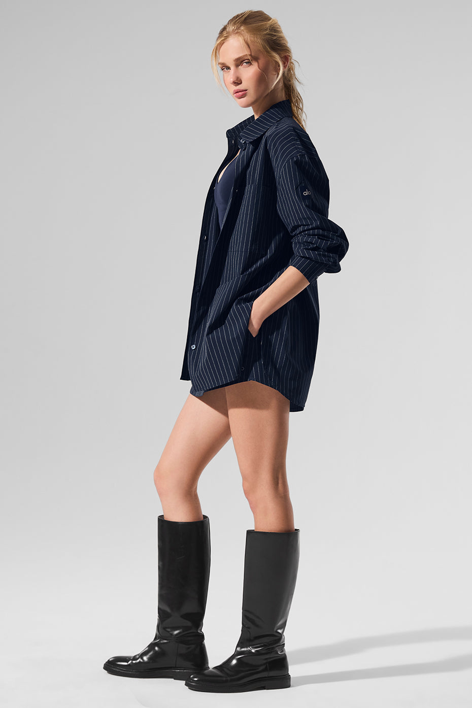 Pinstripe Daylight Button Down Long Sleeve shirt in navy, oversized fit, styled with shiny boots.