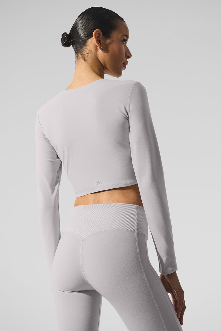 Washed Alosoft Crop Finesse Long Sleeve in light gray, featuring a chic cropped silhouette and long sleeves.