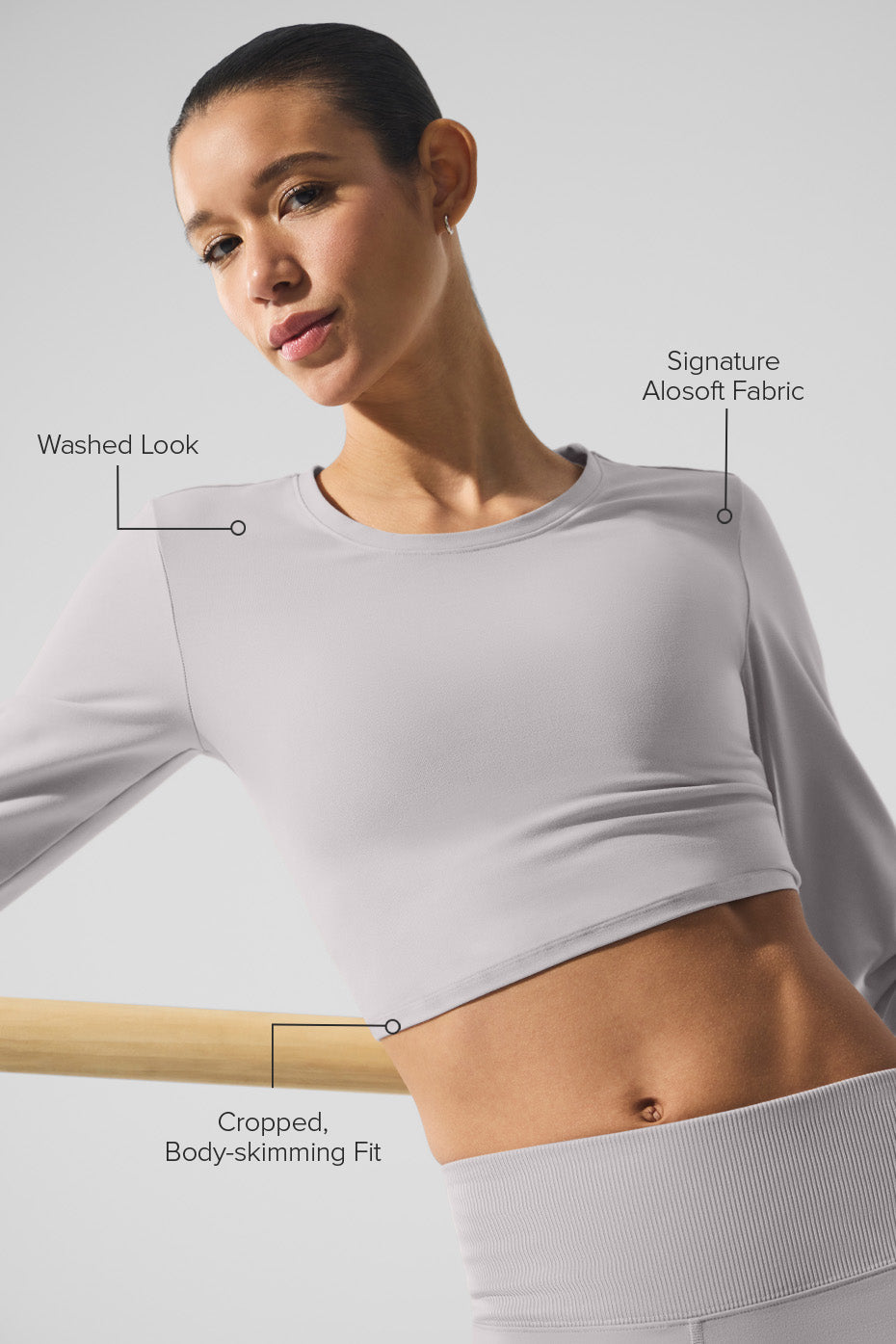 Washed Alosoft Crop Finesse Long Sleeve in light gray, featuring a cropped silhouette and body-skimming fit.