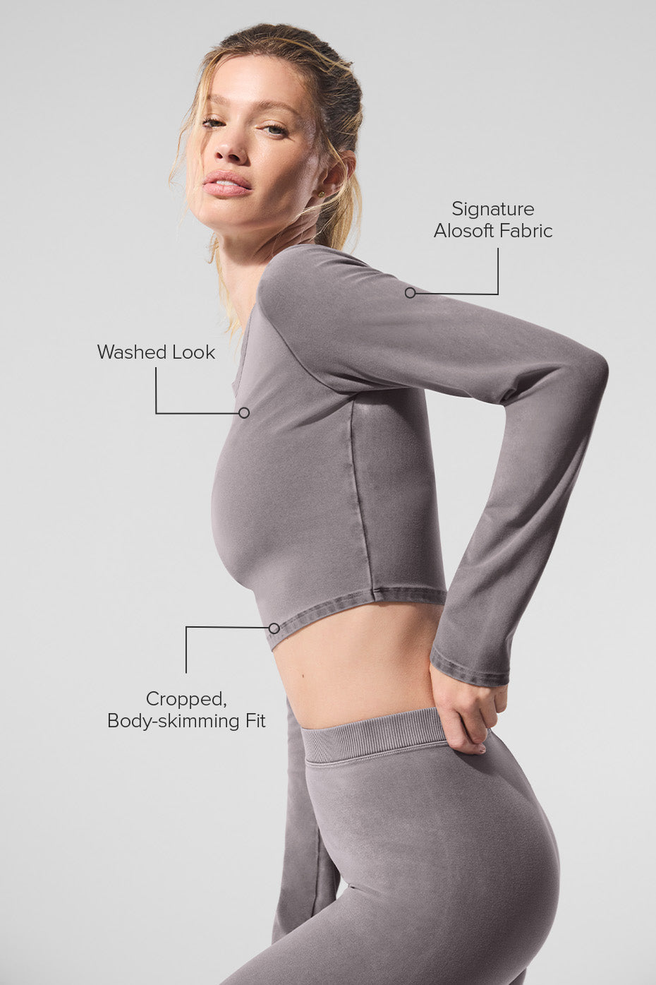 Model wearing Washed Alosoft Crop Finesse Long Sleeve showcasing cropped silhouette and soft fabric.