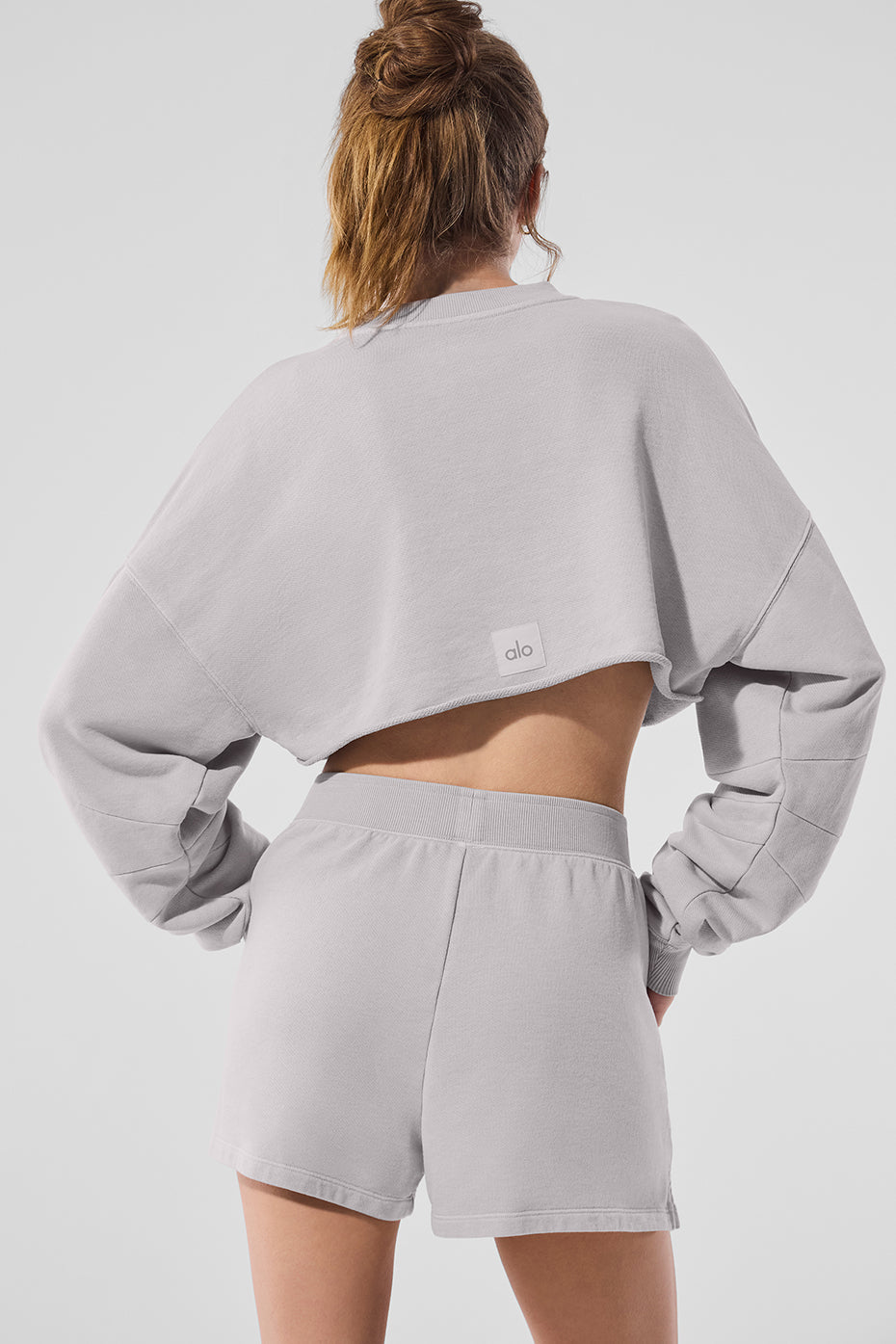 Washed Extreme Cropped Pullover shown from the back, paired with matching shorts, showcasing a trendy ultra-cropped style.