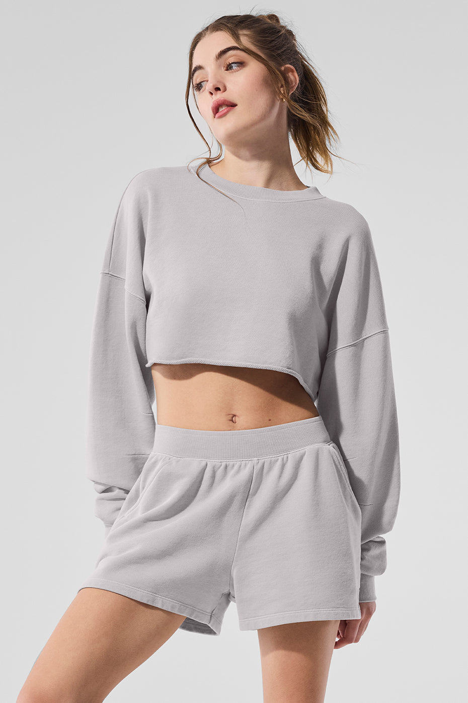 Washed Extreme Cropped Pullover worn with matching shorts in a chic grey fabric for studio-to-street style.