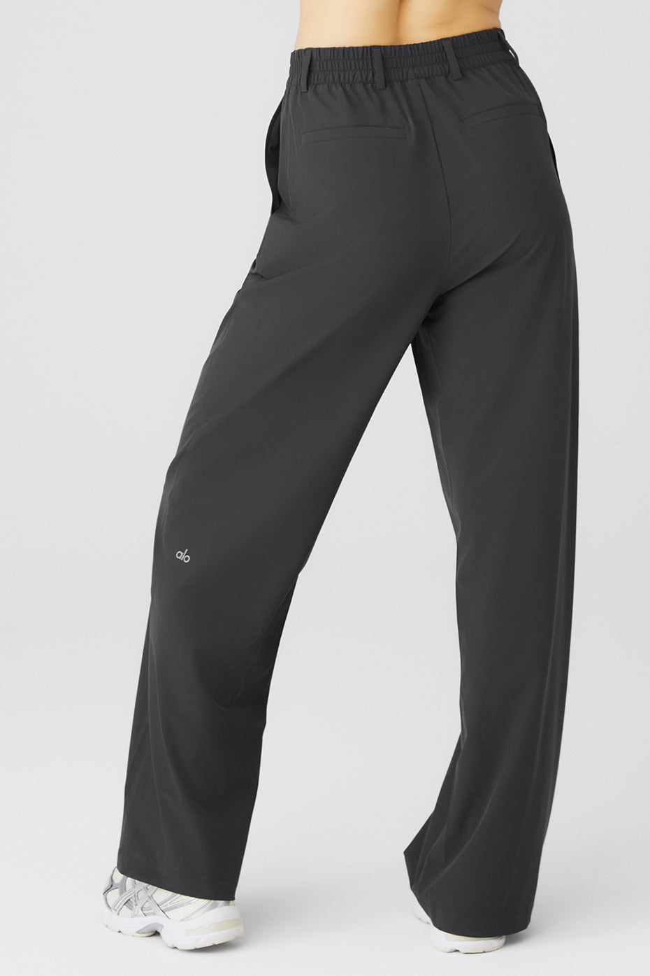 High-waist pursuit trouser featuring a relaxed wide-leg fit and stretchy fabric for comfort and style.