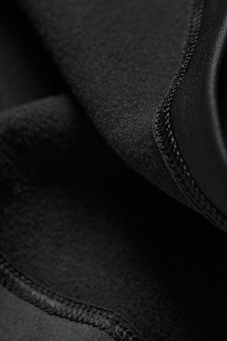 Close-up of black fabric showing the brushed interior of Airlift Winter Warm High-Waist Legging for warmth and comfort.