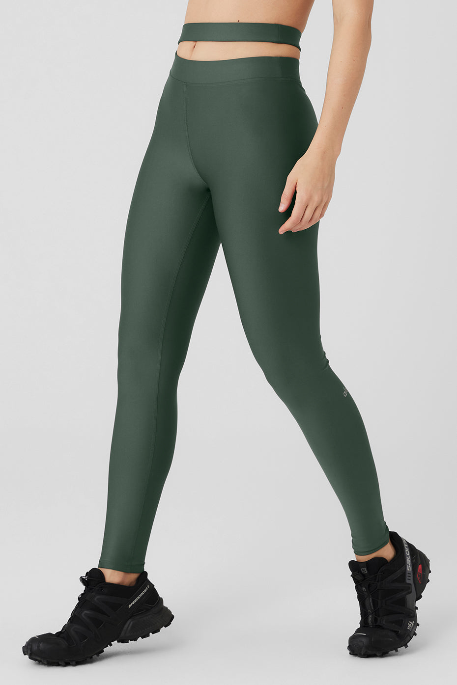 Airlift High-Waist All Access Legging in green with asymmetrical cutout waistband for active wear and stylish outfits.