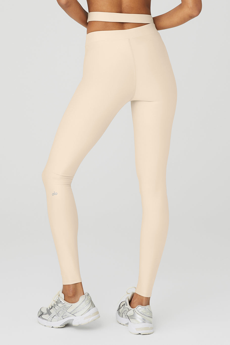 Airlift High-Waist All Access Legging in beige with asymmetrical cutout waistband and sculpting fit for studio and street style.