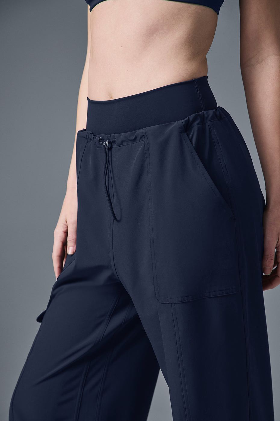 Megastar Cargo Pant close-up showing adjustable bungee waist and pockets in a stylish modern fit.