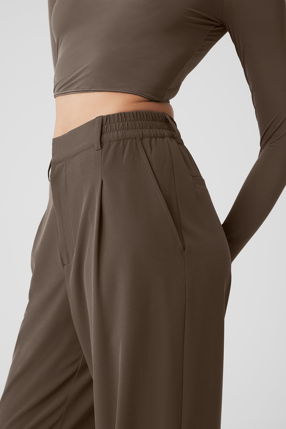 High-waist pursuit trouser featuring a relaxed wide-leg fit and stretchy high-rise waistband for comfort.