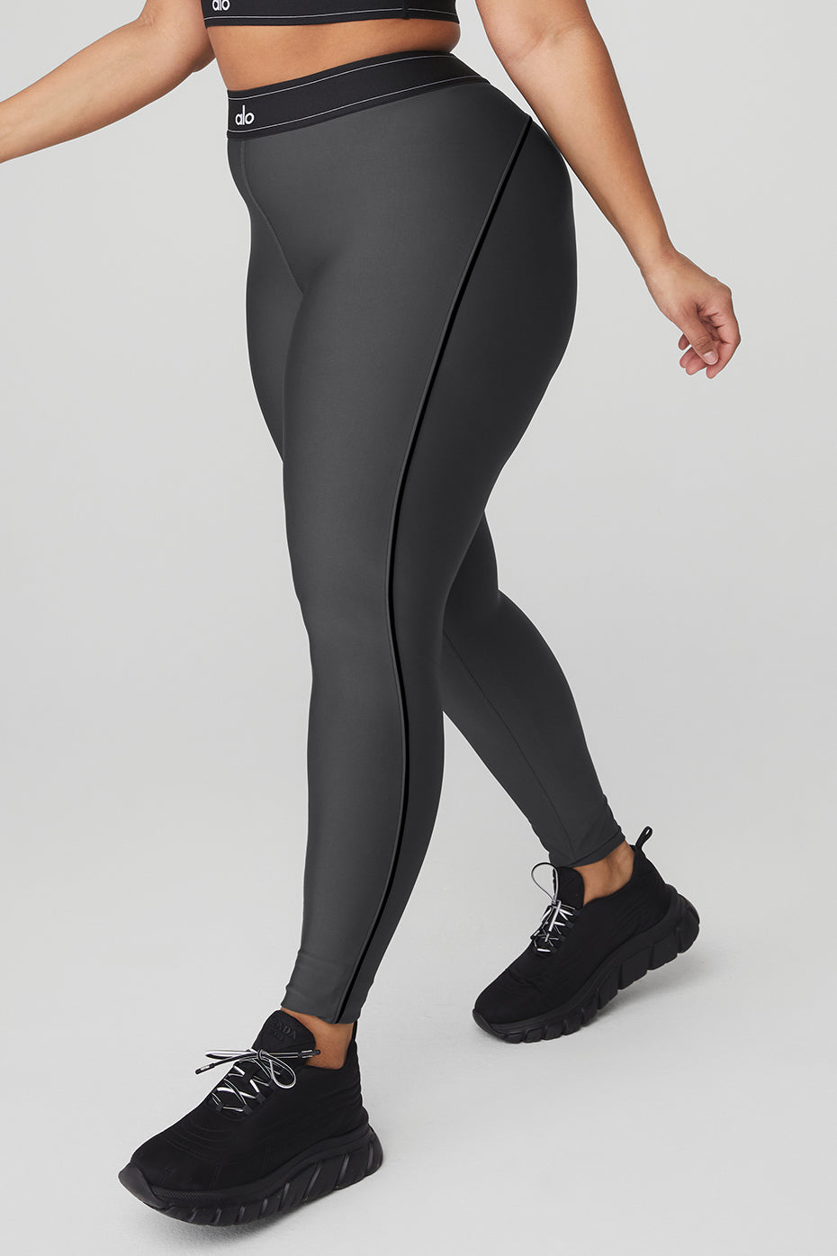 Airlift High-Waist Suit Up Legging in dark gray with boxer-style waistband and body-contouring piping.