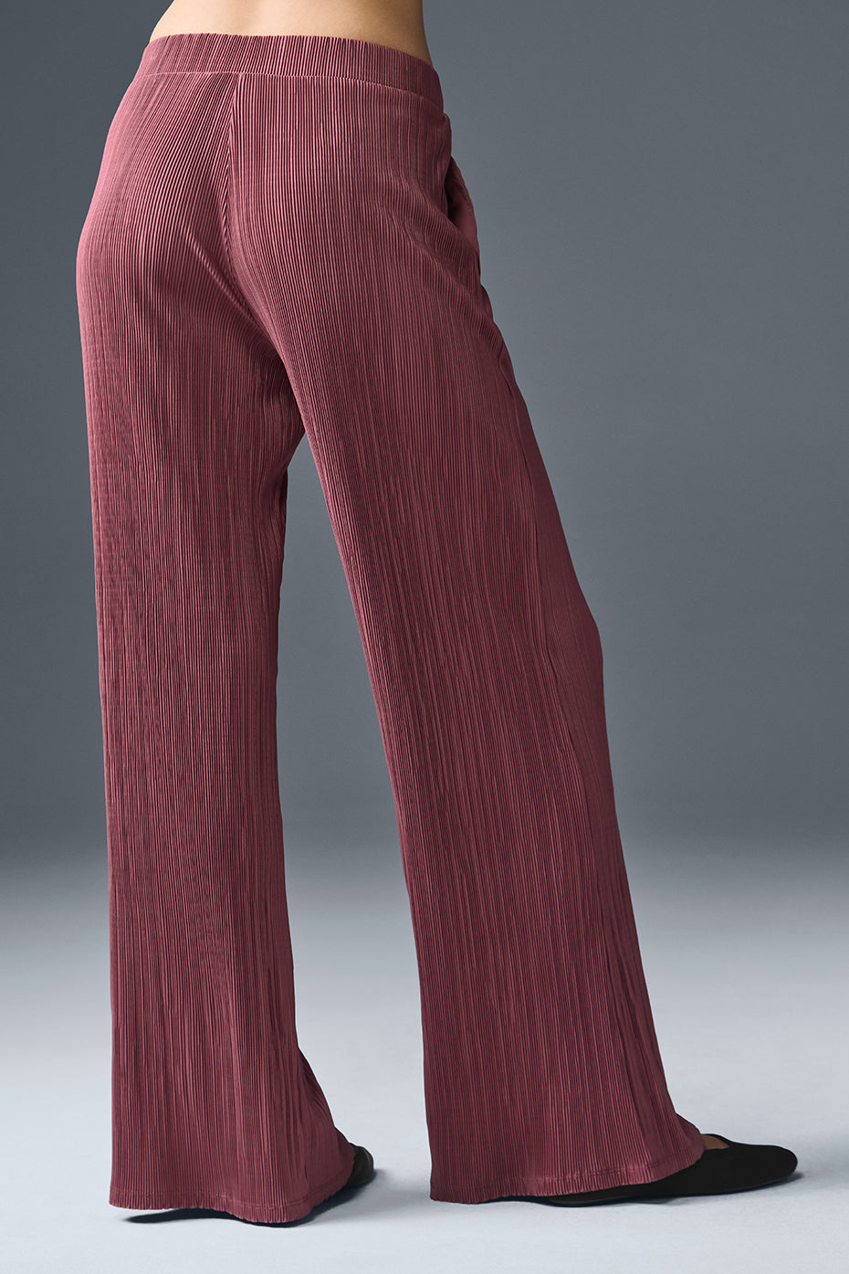 Back view of high-waist micro plisse straight leg pant featuring soft crinkly texture and relaxed fit.