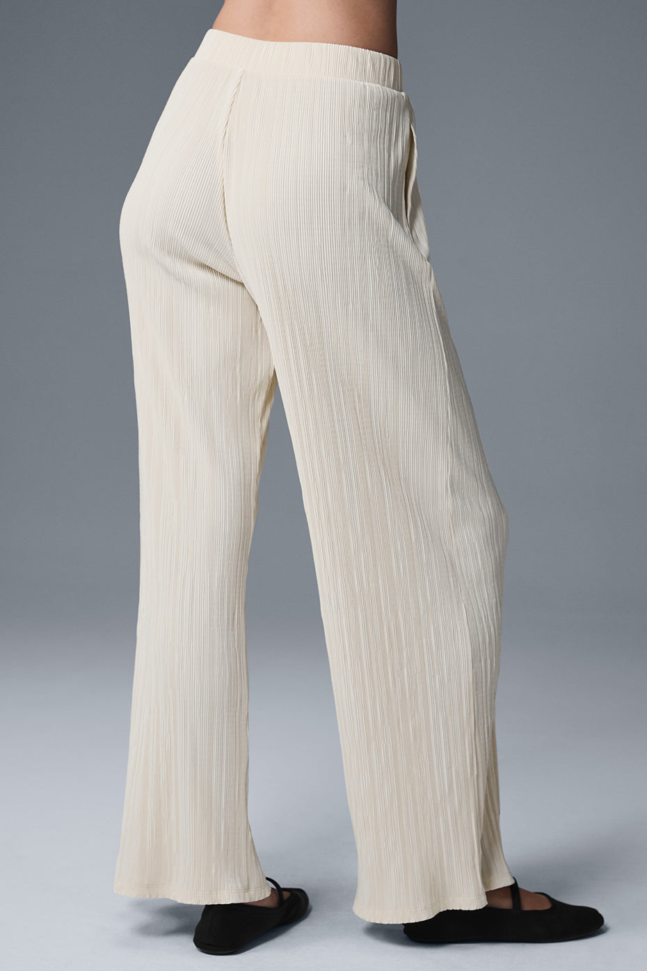 High-waist micro plisse straight leg pant in cream, featuring a relaxed fit and soft crinkly mini-pleat texture.