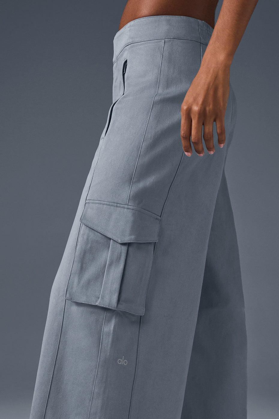 Show Off Cargo Wide Leg Trouser in gray with cargo pockets and a tailored fit, designed for comfort and style.