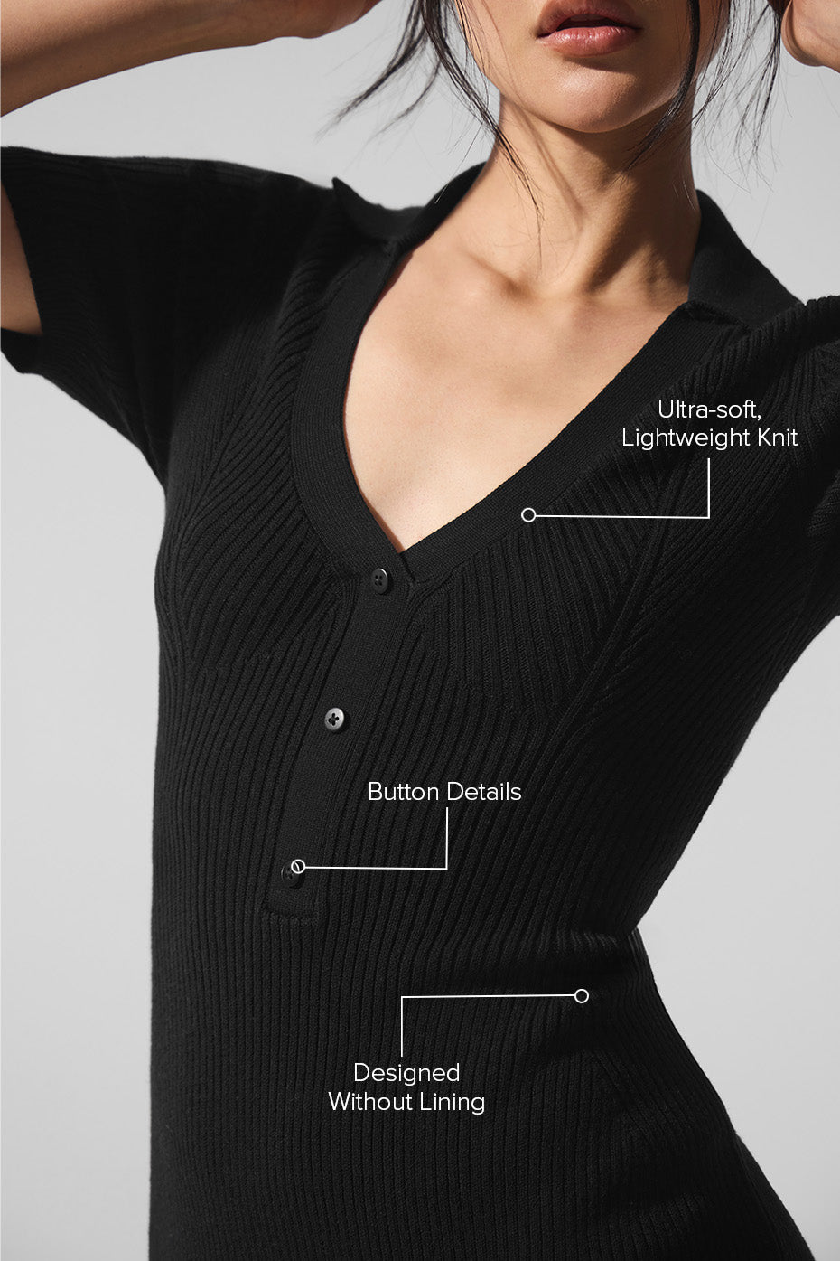 Model wearing the Supernatural Sweater Dress showcasing ultra-soft lightweight knit and button details.