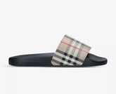 Burberry Furley Check Rubber Sliders featuring signature check strap and lightweight sole for casual comfort and style.