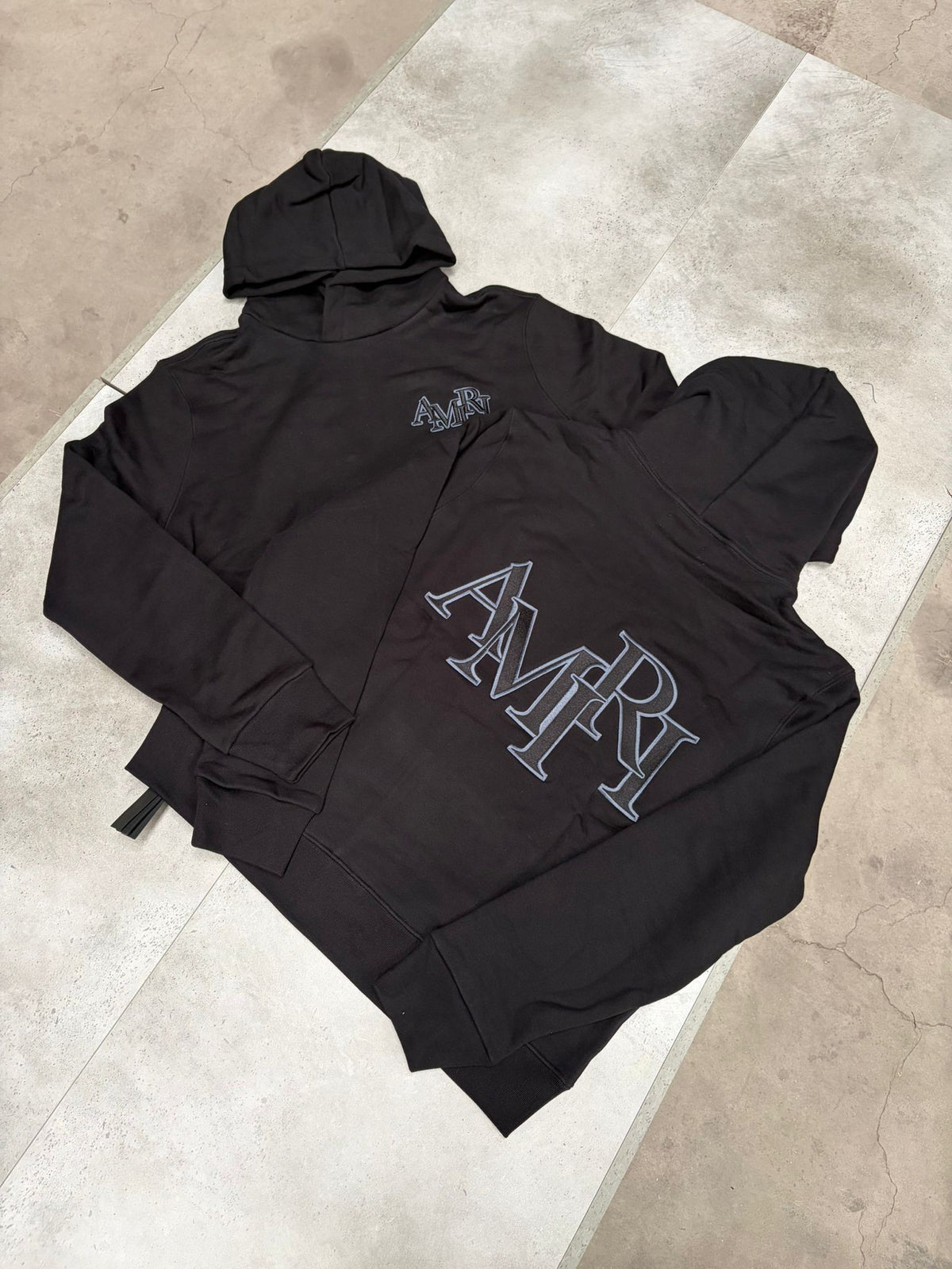 AMIRI Staggered Logo Hoodie in Black