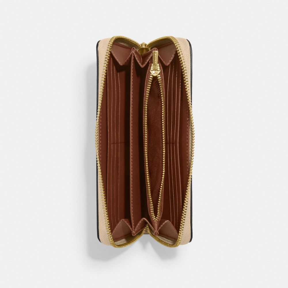 Long Zip Around Wallet In Signature Canvas