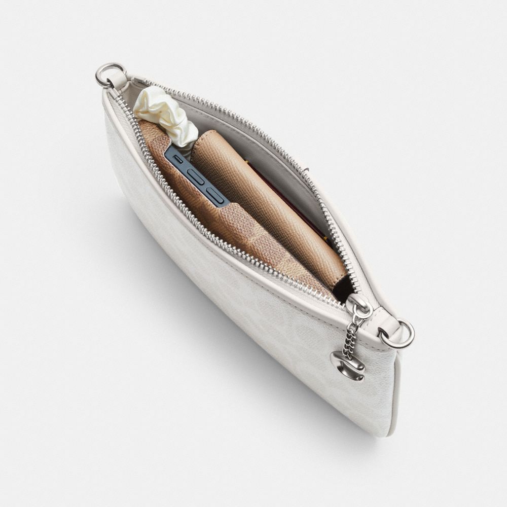 Pouch Bag In Signature Canvas